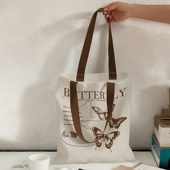 Sac fourre-tout vintage marron avec imprimé papillon et citation