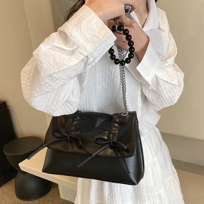 Sac à bandoulière tendance en cuir PU avec chaîne
