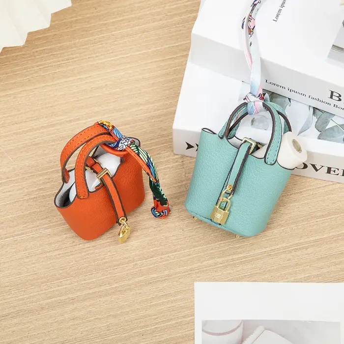 Nouveau Mini maison petit sac en cuir Portable main corde Bluetooth écouteur sac zéro portefeuille multi fonctionnel