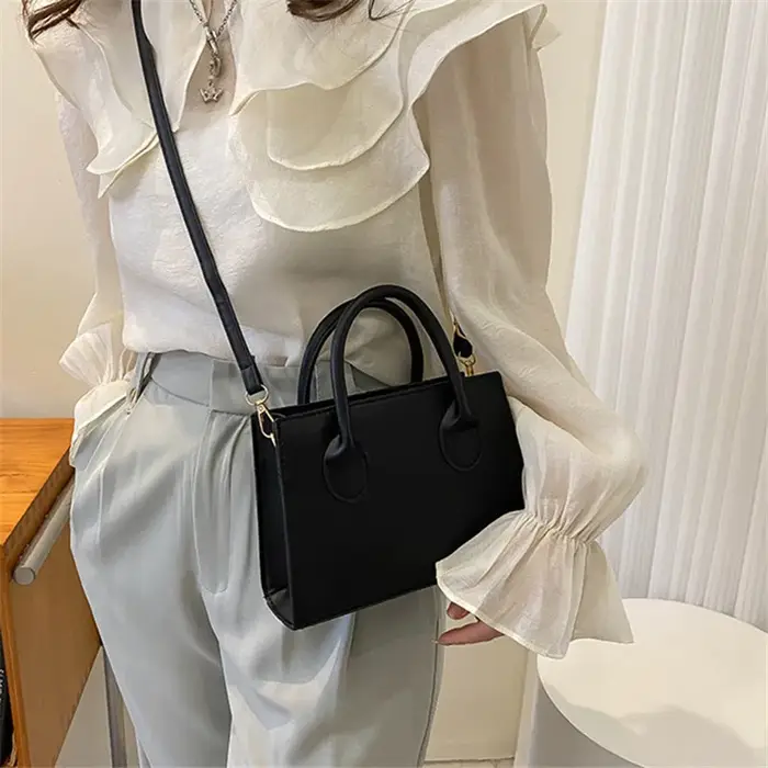 Elegant Black Handbag with Dual Handles