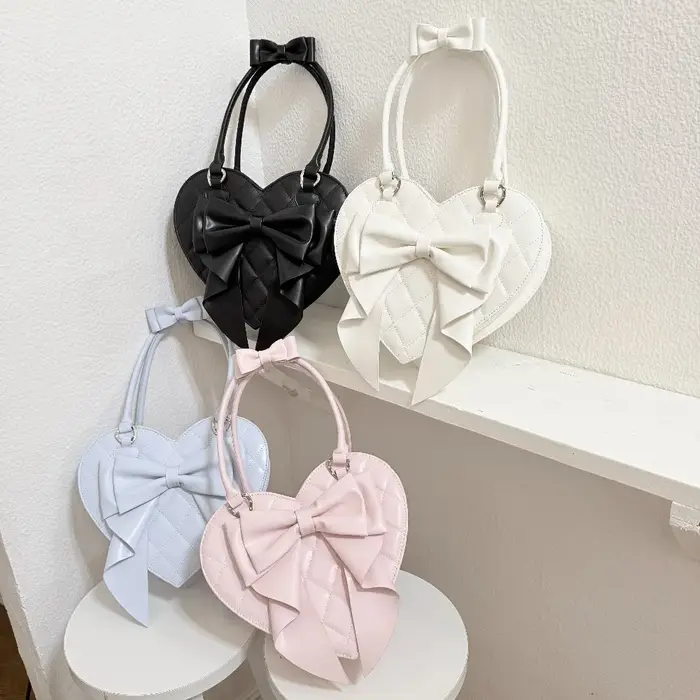 Sacs à main originaux en forme de cœur avec nœud