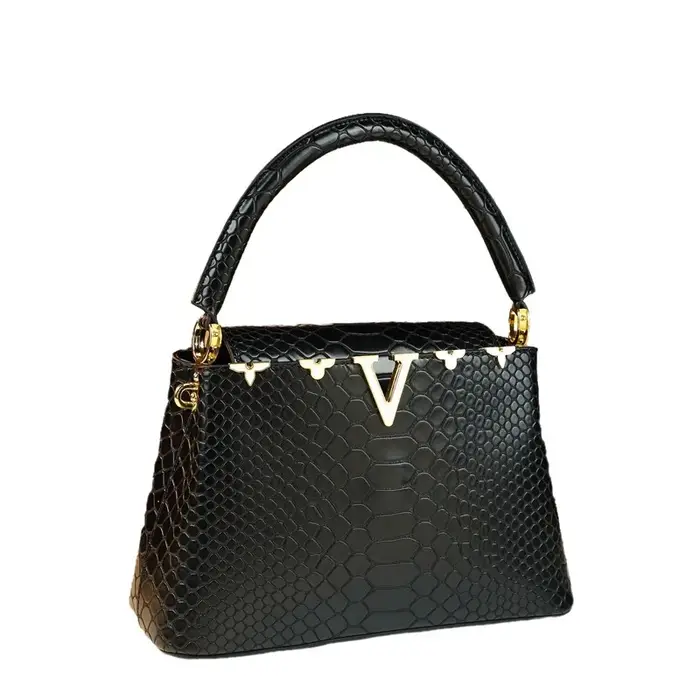 Sac à main à la mode et polyvalent avec une sensation haut de gamme. C'est un sac de niche pour les mamans d'âge moyen