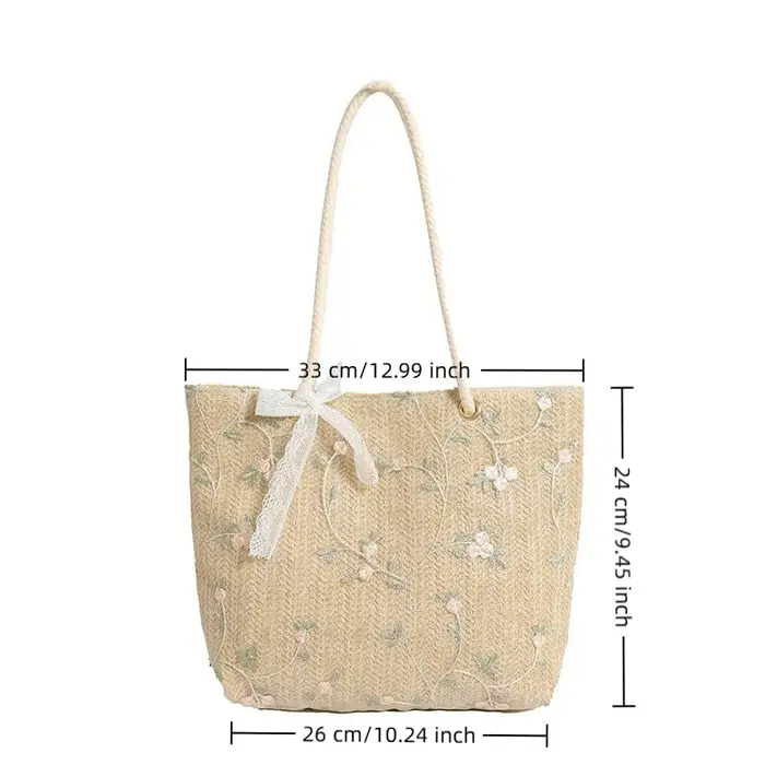 Sac fourre-tout en paille tressée avec broderie florale et détail nœud en dentelle