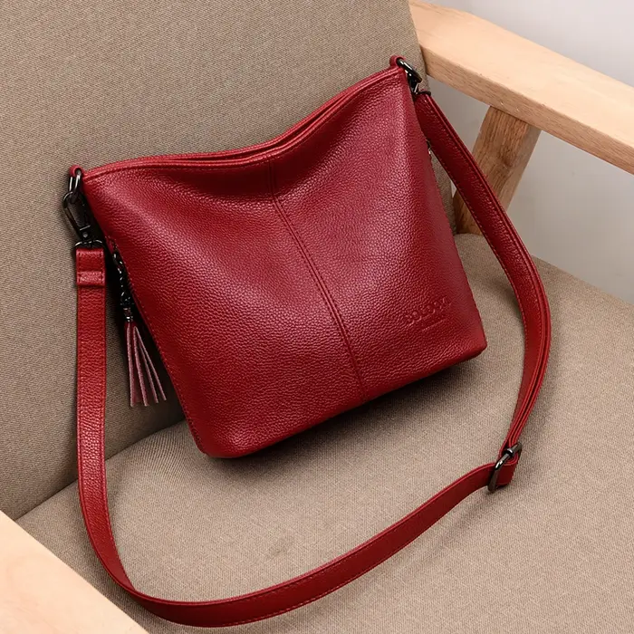 Sac à main en cuir avec pompon pour femme