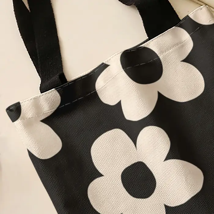 Sac fourre-tout à imprimé floral simple beige sur fond noir