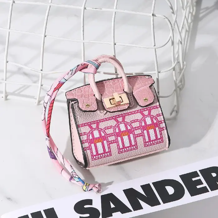 Mini sac décoratif suspendu motif peau de serpent