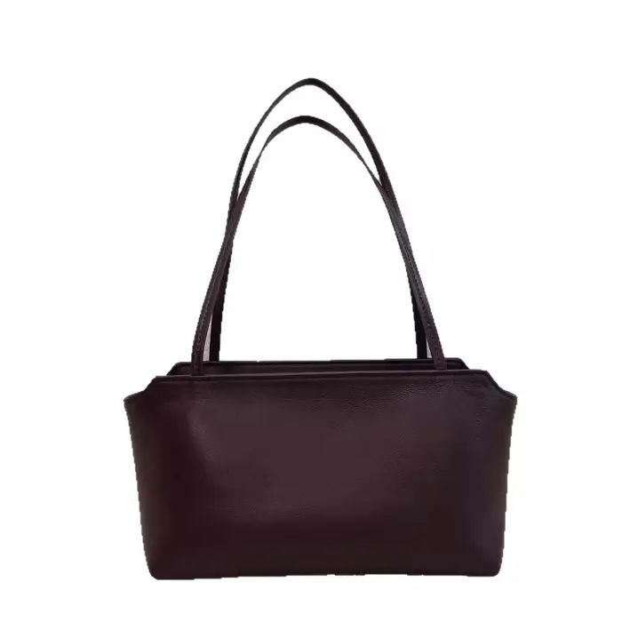 Sac à main d'épaule minimaliste en peau de mouton douce, design de niche, texture haut de gamme, lux