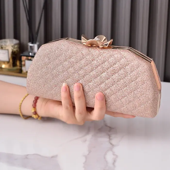 Pochette rose de luxe à motif losanges