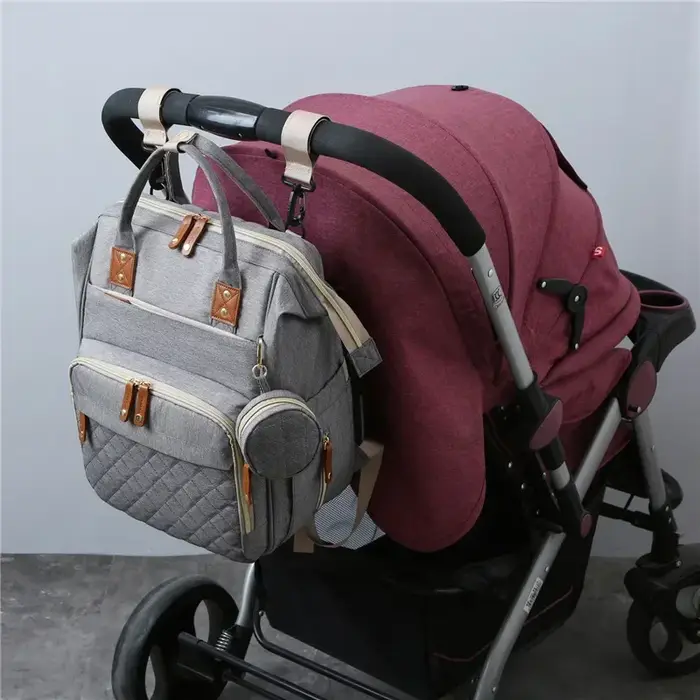 Sac à dos pour maman avec berceau pliable
