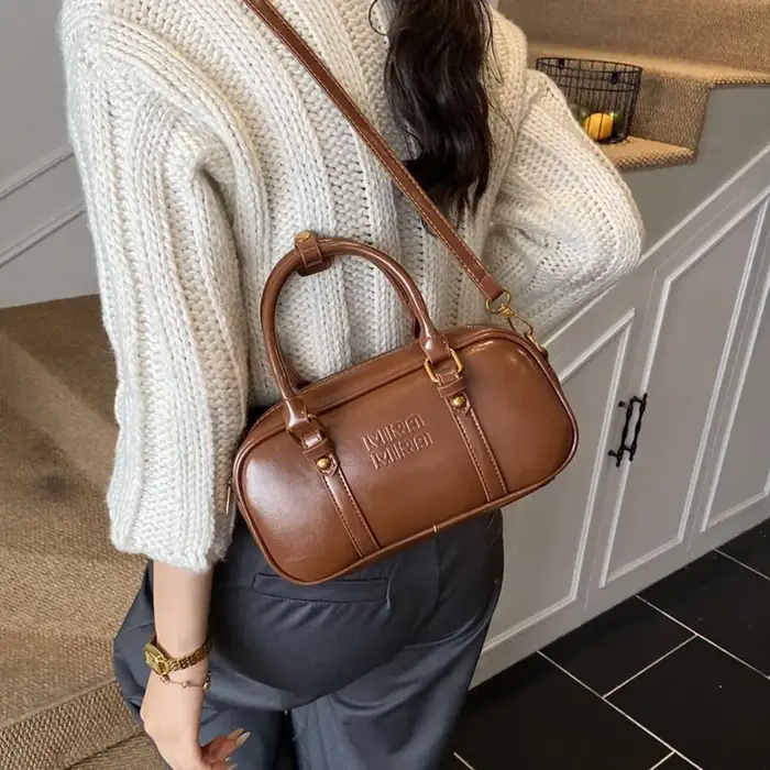 Sac bowling élégant en cuir PU