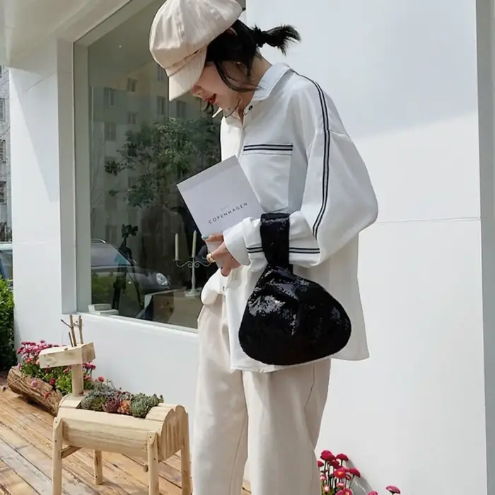 Sac de poignet à nœud pailleté