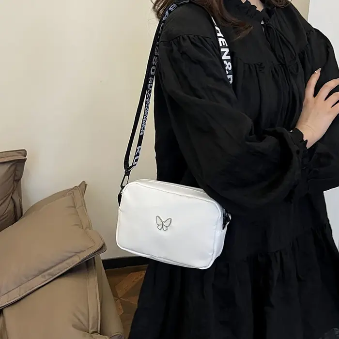 Sac à bandoulière noir et blanc