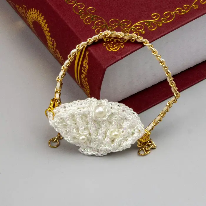 Petit sac carré en cuir tricoté à double poche