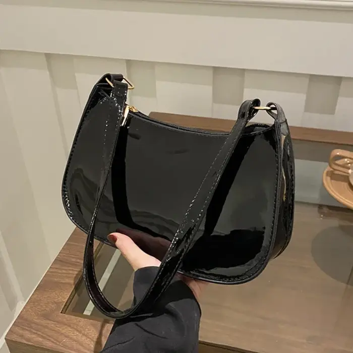Sac à main en cuir verni vintage pour femme