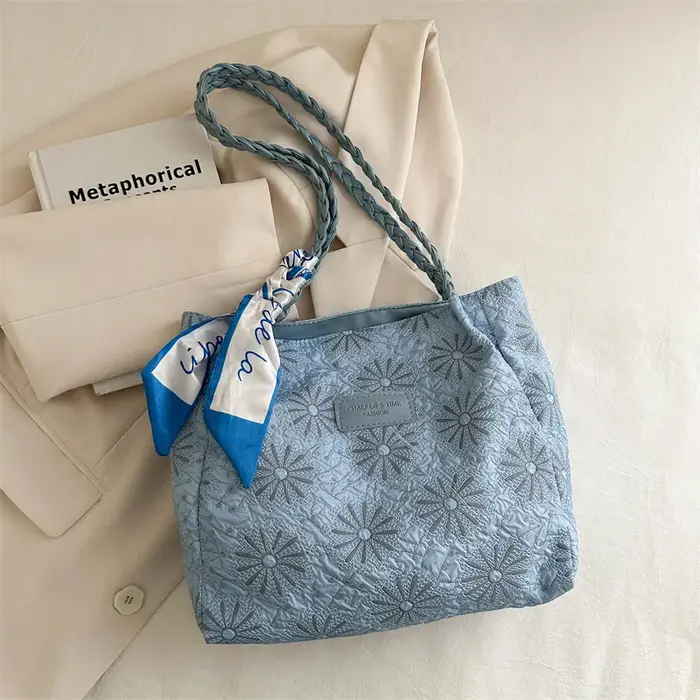 Sac fourre-tout matelassé chic avec bandoulière tressée
