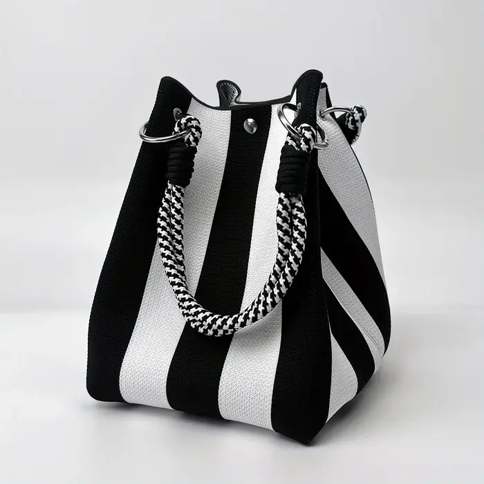 Ce sac à main seau rétro tricoté multicolore est simple et bloquant les couleurs