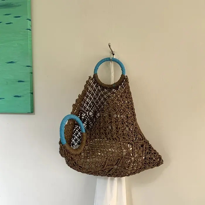 Sac de voyage en raphia et rotin