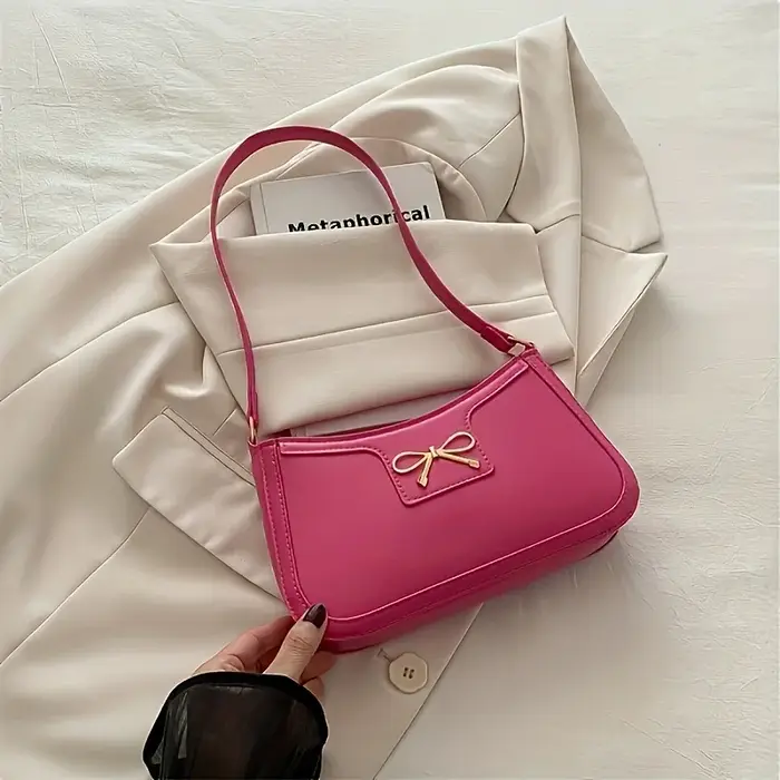 Sac à bandoulière à nœud papillon de couleur unie