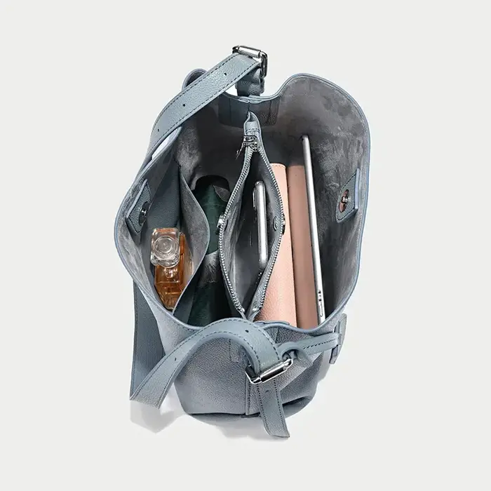 2025 Beige bleu couleur unie Design Simple sac seau en cuir de vachette femmes sac à bandoulière de haute qualité daim intérieur sac de messager