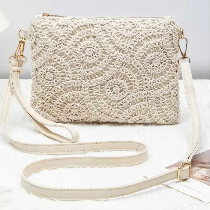 2025 Style bohème polyvalent évider bandoulière tissé sac décontracté plage florale femmes sac à ban