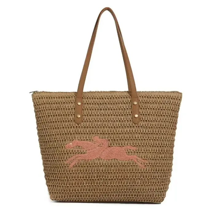 Sac à langer minimaliste de luxe : élégant sac à main bandoulière pour femme avec une touche de design vintage et un grand compartiment.
