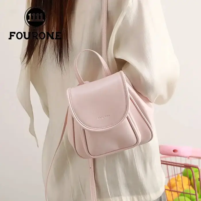 Printemps été poignée Mini sac à dos filles 2025 paquet nouveau un sac à bandoulière mode coréenne sac à dos femmes Pu cartable