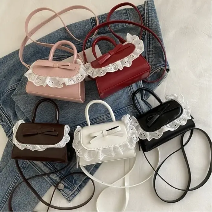 Sac bandoulière mini tendance en cuir PU avec nœud en dentelle