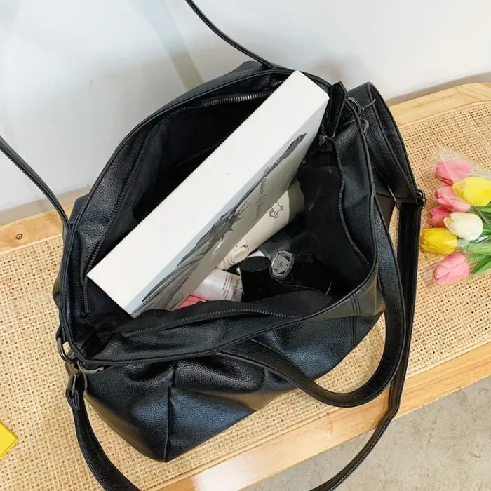 Grands sacs à bandoulière noirs pour femmes