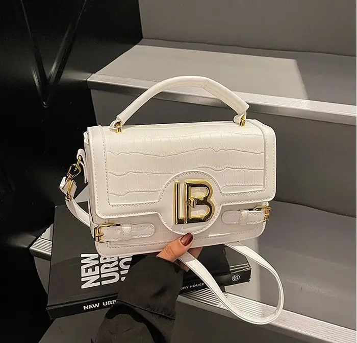 Sac à langer classique : Sac fourre-tout élégant en cuir grande capacité pour femme