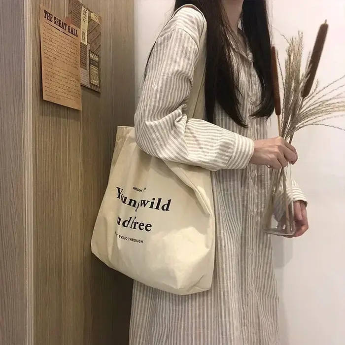 Sac pour femmes pas cher décontracté grande capacité sacs à bandoulière Shopper toile lettre mode Harajuku fermeture