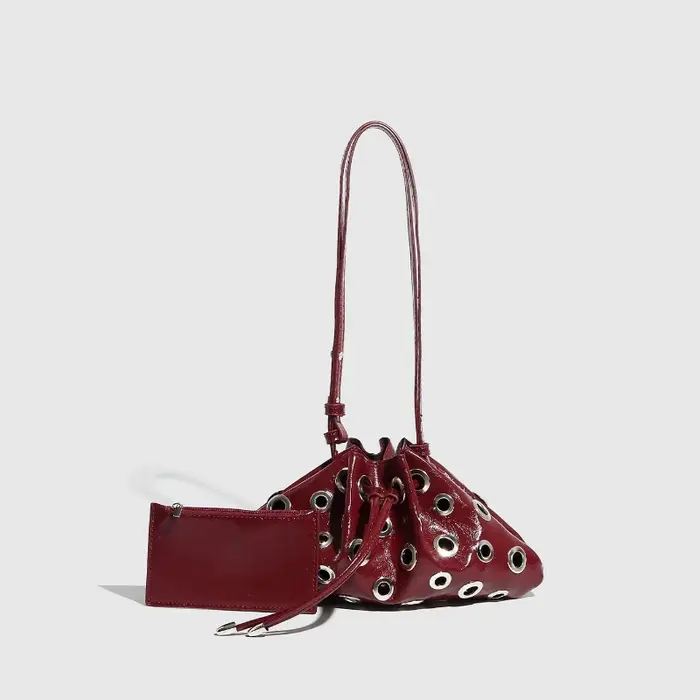 Sac seau pour femme à clous et découpes, avec œillets métalliques et cordon de serrage, sac d'été qu