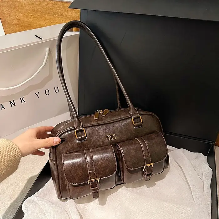 Sac à bandoulière rétro en cuir de couleur unie pour femmes