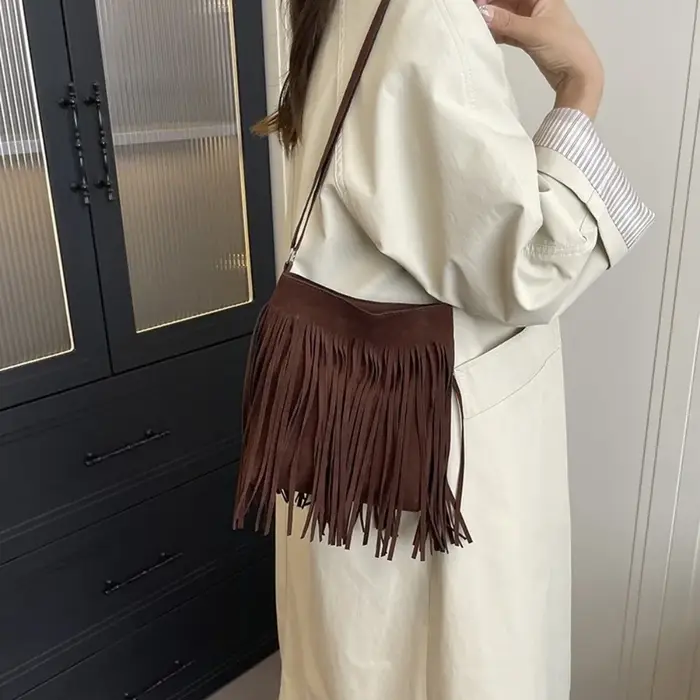 Sac bandoulière vintage en suède à franges