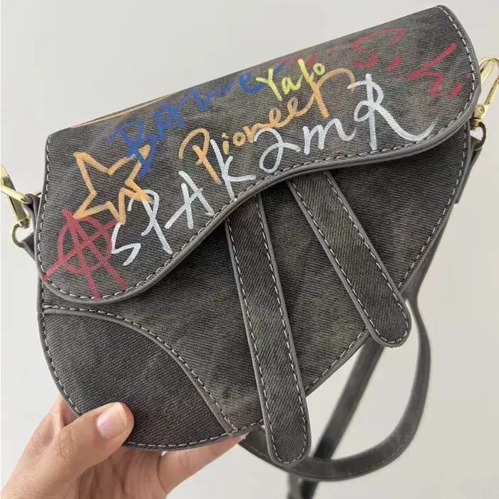 Sac à bandoulière 2025 automne hiver nouveau Denim Graffiti Y2k sac de selle unisexe fourre-tout mod