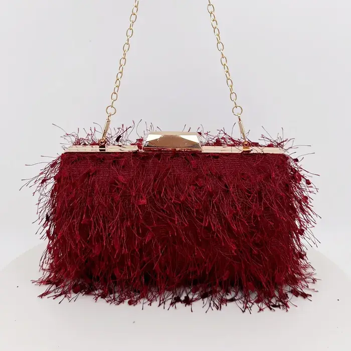 Pochette de soirée à pompon faite à la main