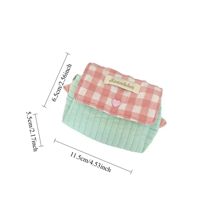 Pochette de maquillage verticale matelassée verte avec boucle rose