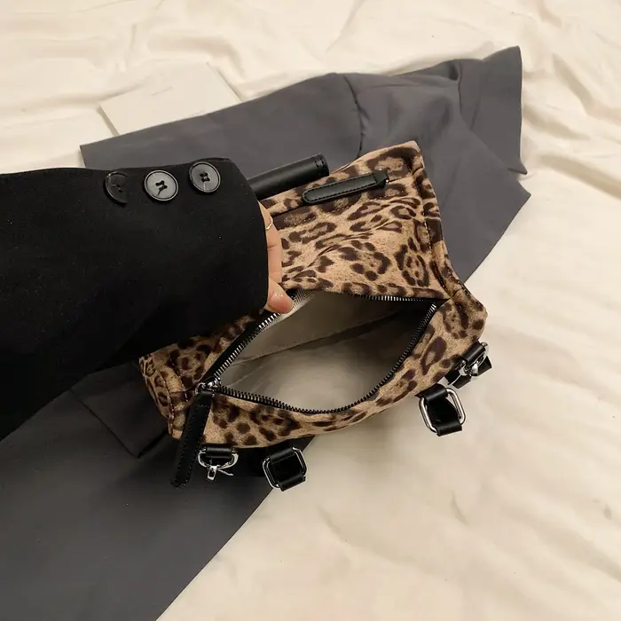 Pochette Vintage en daim léopard