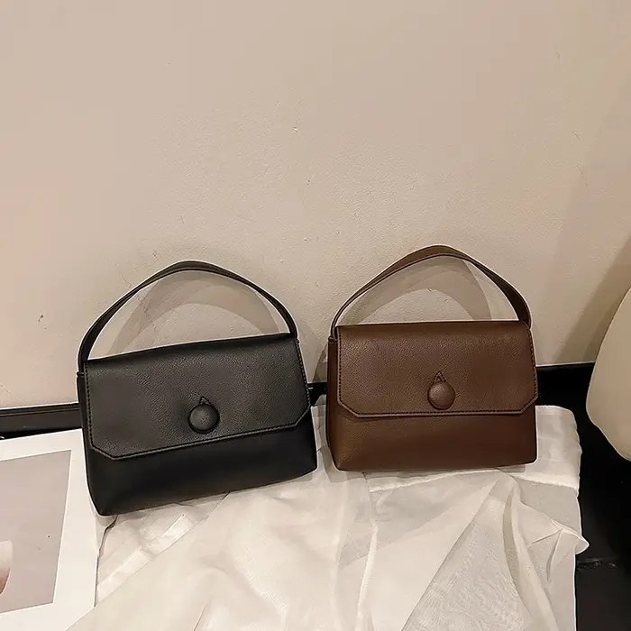Fil à coudre décontracté PU fermeture éclair grande capacité sacs à bandoulière pour les femmes douce personnalité