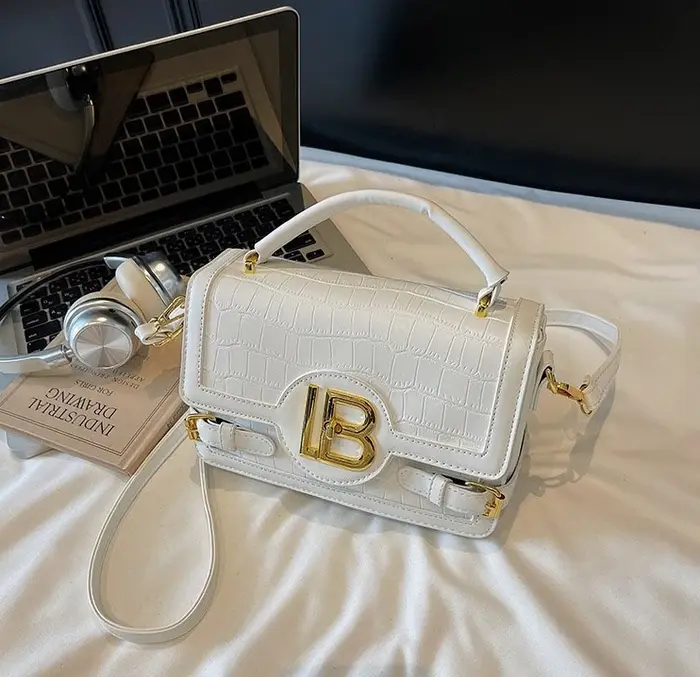 Sac à langer classique : Sac fourre-tout élégant en cuir grande capacité pour femme