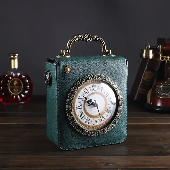 Le nouveau sac créatif pour femme est un sac à bandoulière rétro à main avec une véritable horloge et un petit sac carré brodé