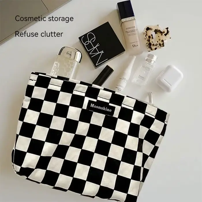 Sac à cosmétiques à carreaux noir et blanc