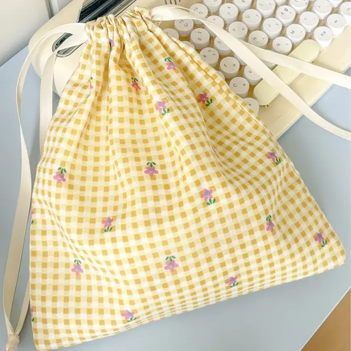 Sac à cordon jaune à motif floral