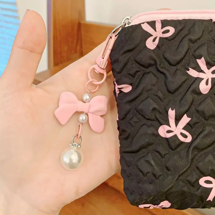 Sac à cosmétiques mignon avec pendentif nœud