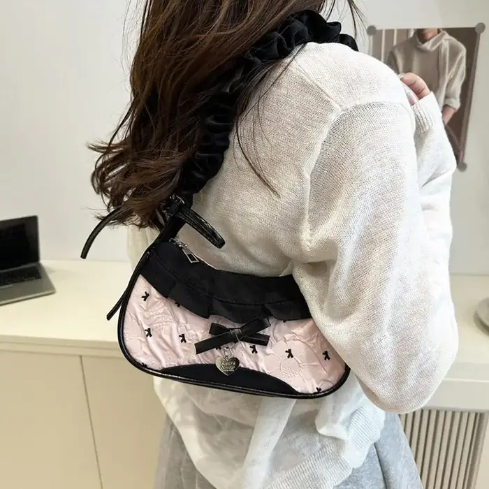 2025 nouveaux Mini sacs à main Cowboy arcs conception sous les bras sac mignon sac à bandoulière décontracté Niche