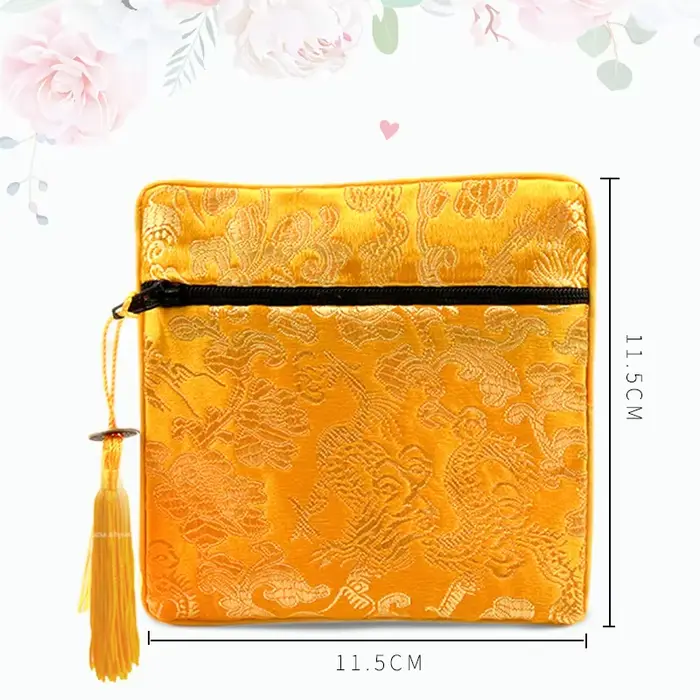 Sac à bijoux classique brodé avec pompon