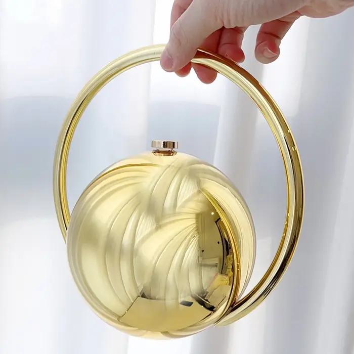 Pochette de soirée de luxe de styliste avec poignée en boule