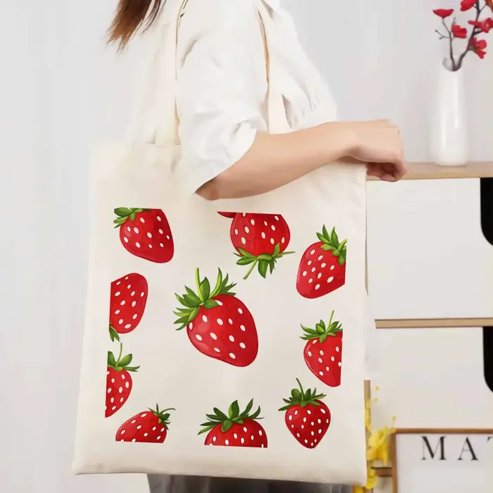 Sac fourre-tout en toile à motif de fraises avec imprimé de fruits blancs, adapté au shopping et à u
