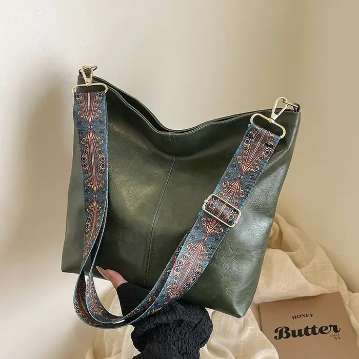 Nouvelle mode européenne et américaine fourre-tout épaule et bandoulière grande capacité sac seau couleur unie PU sac pour femmes tendance de rue