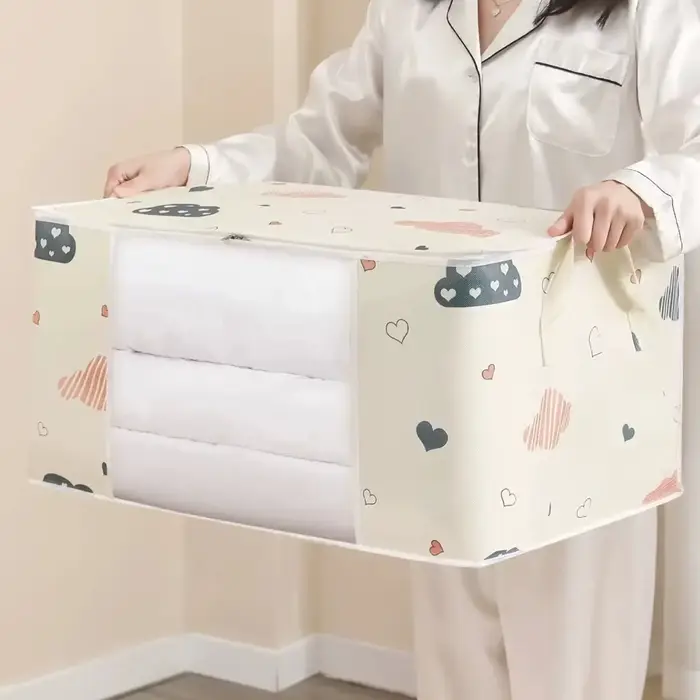 Sac de rangement pour couettes et vêtements