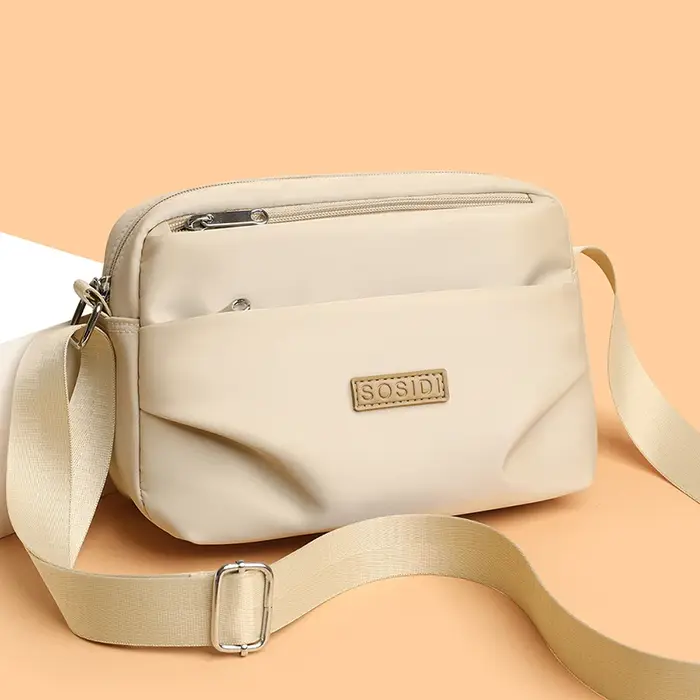 Sac à dos de bureau pour femme de grande capacité - sac en tissu nylon imperméable - sac à bandoulière simple multi-compartiments à la mode - tendance